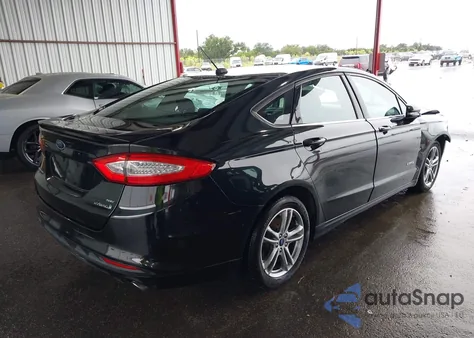 2015 Ford Fusion Hybrid Se z USA, uszkodzony, nr VIN 3FA6P0LU3FR257883